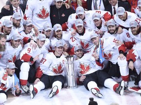 Team Canada poses with the trophy following their victory over Team Europe during World Cup of Hockey finals action in Toronto on Thursday, September 29, 2016.