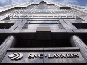 The offices of SNC Lavalin are seen in Montreal on Monday, March 26, 2012. The federal elections commissioner says SNC-Lavalin has entered into a compliance agreement for making nearly $118,000 in contributions that violated the Canada Elections Act over a seven-year period.