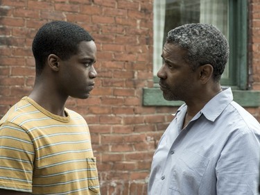 Jovan Adepo (L) and Denzel Washington star in "Fences."