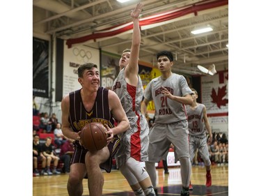 Dr. Martin Leboldus Suns forward Marchus Roflik sets up under the Bedford Road RedHawks' net during first quarter action of the opening game of the Bedford Road Invitational Tournament (BRIT) at Bedford Road Collegiate in Saskatoon, January 12, 2017.