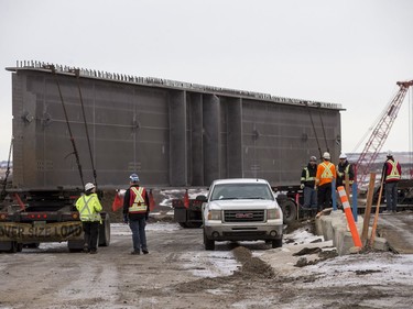 A girder for the new north commuter bridge is delivered to a construction site near the corner of Marquis Drive and Wanuskewin Road in Saskatoon, January 19, 2017.