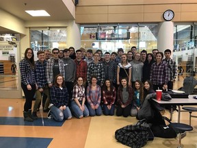Friends of Rebeca Durand paid tribute to their late friend by wearing her signature plaid on Friday at St. Mary High School in Prince Albert. (Courtesy of Deanna Bishop)