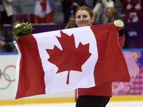 Hayley Wickenheiser, shown following the medals ceremony at the 2014 Olympics, is hanging up her skates.