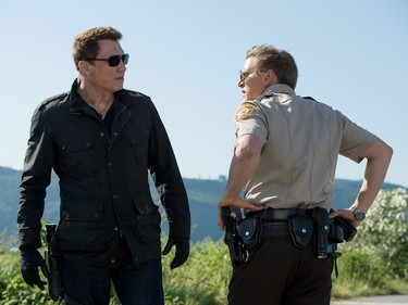 Holt McCallany (L) and Barry Pepper star in "Monster Trucks."