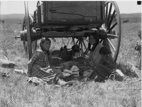 A photo posted on Paul Seeseequasis' Twitter feed. It depicts the Little Owl family in the shade in Montana in 1909. The photo was taken by Walter McClintock.