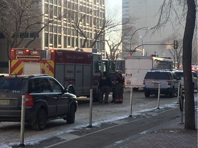 Members of the Saskatoon Fire Department can be seen in downtown Saskatoon on Thursday, Jan. 26, 2017. An employee at the UPS store in downtown Saskatoon called emergency responders after he opened a package, which he said contained what appeared to be a 'dark' substance in what looked to be surgical gloves. (Morgan Modjeski/The Saskatoon StarPhoenix)