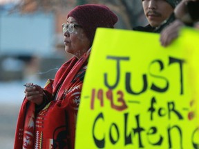 Colton Boushie's mother Debbie Baptiste stands with family outside of North Battleford provincial court in North Battleford on January 17, 2017.