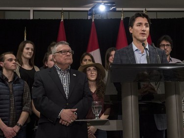 Prime Minister Justin Trudeau speaks to media, as Public Safety Minister Ralph Goodale looks on, prior to heading to a lecture hall to take questions from the public at the Health Sciences Building on the University of Saskatchewan campus in Saskatoon, January 25, 2017.