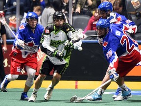 Ryan Keenan (centre) pursues the ball during action last weekend in Toronto.