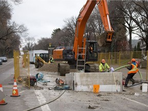 A City of Saskatoon crew rehabilitates the sewer at the intersection of Lorne Avenue and Eighth Street in November of 2015.