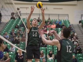 (#14) Derek Epp attempts to return the ball during the game against Budo International at the PAC facility located on the University of Saskatchewan campus in Saskatoon, Saskatchewan on Thursday, December 29th, 2016.