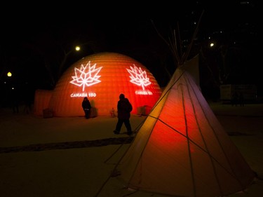 Those attending the Canada 150 celebrations in Saskatoon walk around to various attractions in Kiwanis Memorial Park, Saturday Dec. 31, 2016.