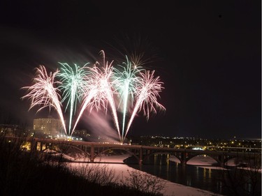 Fireworks are displayed on the Broadway Bridge for the Canada 150 celebration in Saskatoon, Sask., Saturday Dec. 31, 2016.