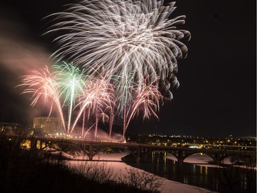 Fireworks are displayed on the Broadway Bridge for the Canada 150 celebration in Saskatoon, Sask., Saturday Dec. 31, 2016.