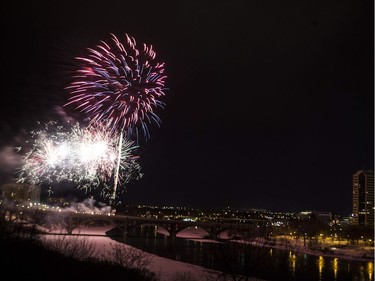 Fireworks are displayed on the Broadway Bridge for the Canada 150 celebration in Saskatoon, Sask., Saturday Dec. 31, 2016. (Kayle Neis/Saskatoon StarPhoenix)