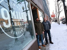 SASKATOON, SK - January 10, 2017 -  Co-founders of 9 Mile Legacy Brewing Company Garrett Pederson and Shawn Moen stand outside of their building on 20th Street which will be the new location for their brewery on January 10, 2017. The purchase of this building, which was scheduled to be demolished, shows the interest in 20th Street that has resulted in a sharp rise in property values.(Michelle Berg / Saskatoon StarPhoenix)