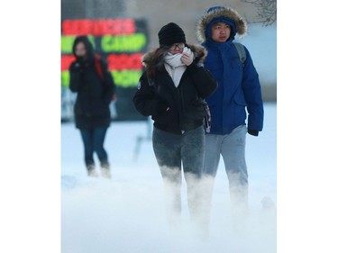 University of Saskatchewan students bundled up for their freezing walk to school Wednesday morning, January 11, 2017, while Environment Canada issued an extreme cold warning for Saskatoon. Saskatoon's temperature was -44 C with the windchill