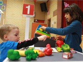 Eric Lawton and Zahra Gokavi Bailey are some of the first to try out a prototype for one of the new Children's Discovery Museum exhibits, "Toon Town" at North Park Wilson school in Saskatoon on Jan. 15, 2017.