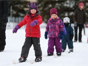 L-R: Sadie Cocks, Clara Hooyenga and Andrew Salter learn how to ski with the "bunny rabbits" group in the Saskatoon Nordic ski club at Kinsmen Park in Saskatoon on January 15, 2017.