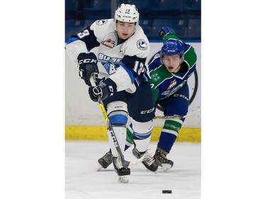 Saskatoon Blades' Cole Johnson skates with the puck during first period action against the Swift Current Broncos at SaskTel Centre in Saskatoon on January 22, 2017.