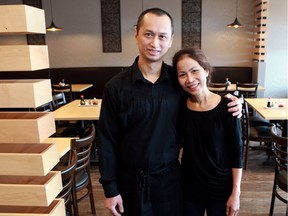 Teapot Asian Restaurant owners Huong Nguyen and Thong "Tony" Tran stand in their dining area in Saskatoon on January 30, 2017. (Michelle Berg / Saskatoon StarPhoenix)