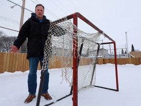 SASKATOON, SK - January 9, 2017 - Kevin Boychuk points out the tattered nets at the Sutherland School ice rink, one of many areas that needs improvement, in Saskatoon on January 9, 2017. (Michelle Berg / Saskatoon StarPhoenix)