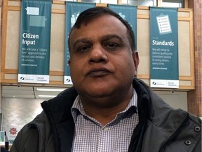 Saskatoon taxi driver Malik Umar Draz wants the city to pass legislation that would make safety shields mandatory in cabs. Photo by Andrea Hill.
