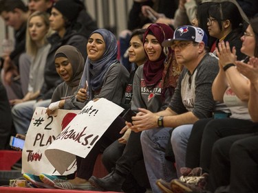 Bedford Road RedHawks fans cheer on their team as they take on the Dr. Martin Leboldus Suns during first quarter action of the opening game of the Bedford Road Invitational Tournament (BRIT) at Bedford Road Collegiate in Saskatoon, January 12, 2017.