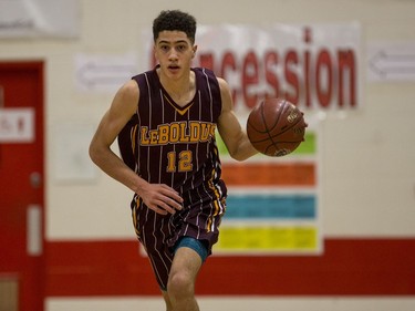 Dr. Martin Leboldus Suns forward Matt Barnard moves the ball against the Bedford Road RedHawks during first quarter action of the opening game of the Bedford Road Invitational Tournament (BRIT) at Bedford Road Collegiate in Saskatoon, January 12, 2017.
