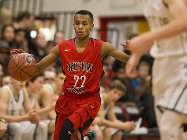 Bedford Road RedHawks guard Mohamed Salah moves the ball against the Seminaire Saint Joseph Vert et Or during their game in the Bedford Road Invitational Tournament (BRIT) at Bedford Road Collegiate in Saskatoon, January 13, 2017.