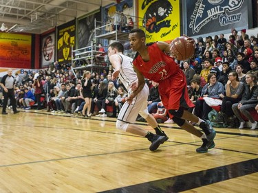 Bedford Road RedHawks guard Mohamed Salah moves the ball against the Seminaire Saint Joseph Vert et Or during their game in the Bedford Road Invitational Tournament (BRIT) at Bedford Road Collegiate in Saskatoon, January 13, 2017.