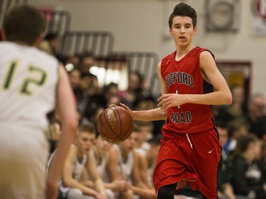 Bedford Road RedHawks guard Cody Clinker moves the ball against the Seminaire Saint Joseph Vert et Or during their game in the Bedford Road Invitational Tournament (BRIT) at Bedford Road Collegiate in Saskatoon, January 13, 2017.