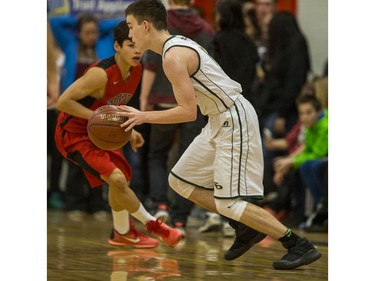 Seminaire Saint Joseph Vert et Or guard Vincent Gratton Marcotte moves the ball against the Bedford Road RedHawks during their game in the Bedford Road Invitational Tournament (BRIT) at Bedford Road Collegiate in Saskatoon, January 13, 2017.