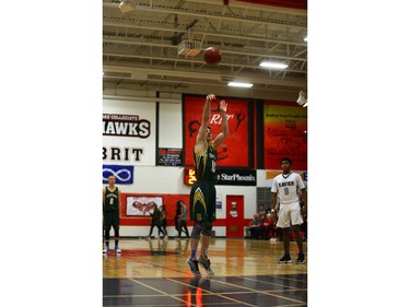 Campbell Collegiate Tartans forward Justin Myles takes a foul shot against the St. Francis Xavier Rams during the final game of the Bedford Road Invitational Tournament in Saskatoon, January 14, 2017.