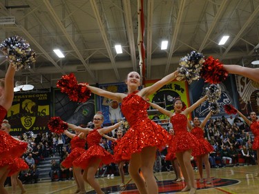 The Bedford Road Pom Squad performs at the halftime of the home team Marion Graham Falcons during the Bedford Road Invitational Tournament in Saskatoon, January 14, 2017.