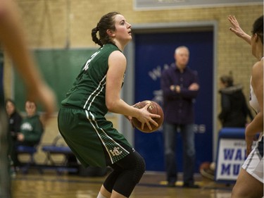 Holy Cross Crusader's Kyla Shand sets up to take a shot against the Walter Murray Marauders  in high school girl's basketball action at Walter Murray Collegiate in Saskatoon, January 17, 2017.