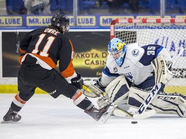 Medicine Hat Tigers forward Steven Owre can't get this penalty shot past Saskatoon Blades goalie Logan Flodell during first period WHL action in Saskatoon, January 18, 2017.