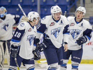 Saskatoon Blades defense Libor Hajek heads to the bench after taking a late hit from the Medicine Hat Tigers during first period WHL action in Saskatoon, January 18, 2017.