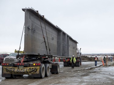 A girder for the new north commuter bridge is delivered to a construction site near the corner of Marquis Drive and Wanuskewin Road in Saskatoon, January 19, 2017.