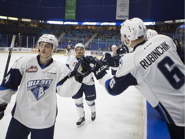 Saskatoon Blades defense Bryton Sayers celebrates with defense Mark Rubinchik after the Blades scored a goal during the game against the Brandon Wheat Kings at SaskTel Centre in Saskatoon, January 20, 2017.