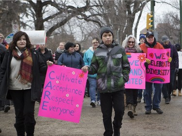In solidarity with the women's march held in Washington D.C. a day after President Donald Trump's inauguration, marchers walk into Saskatoon's downtown core to support women's rights, January 21, 2017.