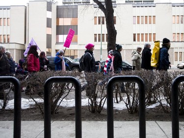 In solidarity with the women's march held in Washington D.C. a day after President Donald Trump's inauguration, marchers walk into Saskatoon's downtown core to support women's rights, January 21, 2017.