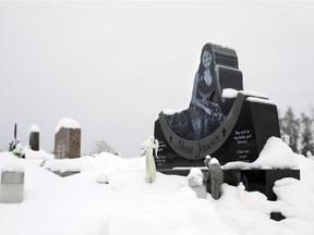 The grave of teacher's aide Marie Janvier, who was killed in the school shootings in La Loche, Sask., is shown on Monday, January 9, 2016.