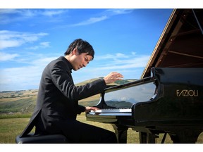 Thomas Yu, originally from Saskatoon, is a Calgary dentist who wins international piano competitions. Handout.