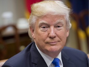 US President Donald Trump speaks during a meeting with automobile industry leaders in the Roosevelt Room of the White House in Washington, DC, January 24, 2017. /