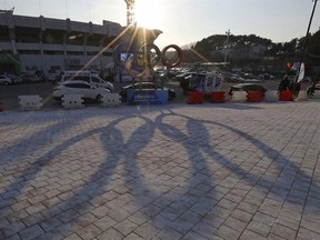 The Olympic rings cast a shadow near the 2018 Pyeongchang Winter Olympics venues in Gangneung, South Korea, Thursday, Feb. 9, 2017. An analytics company predicts a big Winter Olympics for Norway and says Canada will finish fourth in total medals won next year in Pyeongchang, South Korea. THE CANADIAN PRESS/AP, Lee Jin-man