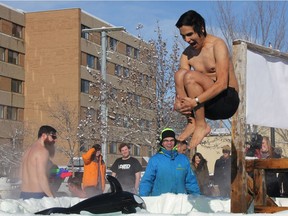 A participant at the fifth annual Polar Dip to Fight Human Trafficking event in Saskatoon takes an icy plunge. The event hoped to raise $5,000 and awareness for organizations combatting human trafficking here in Saskatchewan and around the world. 18 people took part in event, which took place at the Saskatoon Farmers' Market on Feb. 11, 2017. (Morgan Modjeski/The Saskatoon StarPhoenix)