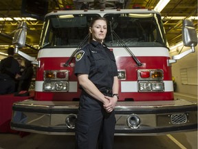 New Saskatoon Fire Department firefighter Jacquelyn Bell stands for a photograph following a firefighter graduating class of 2017 ceremony at Fire Hall No. 1 in Saskatoon, Sask. on Thursday, February 2, 2017.