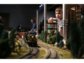 3-year-old August Gray watches the Saskatoon Railway Modellers – G Scale exhibit at the All Aboard Model Train Show at the Western Development Museum in Saskatoon on February 26, 2017. (Michelle Berg / Saskatoon StarPhoenix)