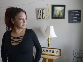 REGINA, SASK : February 26, 2017 - Alison Moneybird-Morgan looks out the window of her home. Her brother, Jesse Moneybird, was shot last night in the home. MICHAEL BELL / Regina Leader-Post.